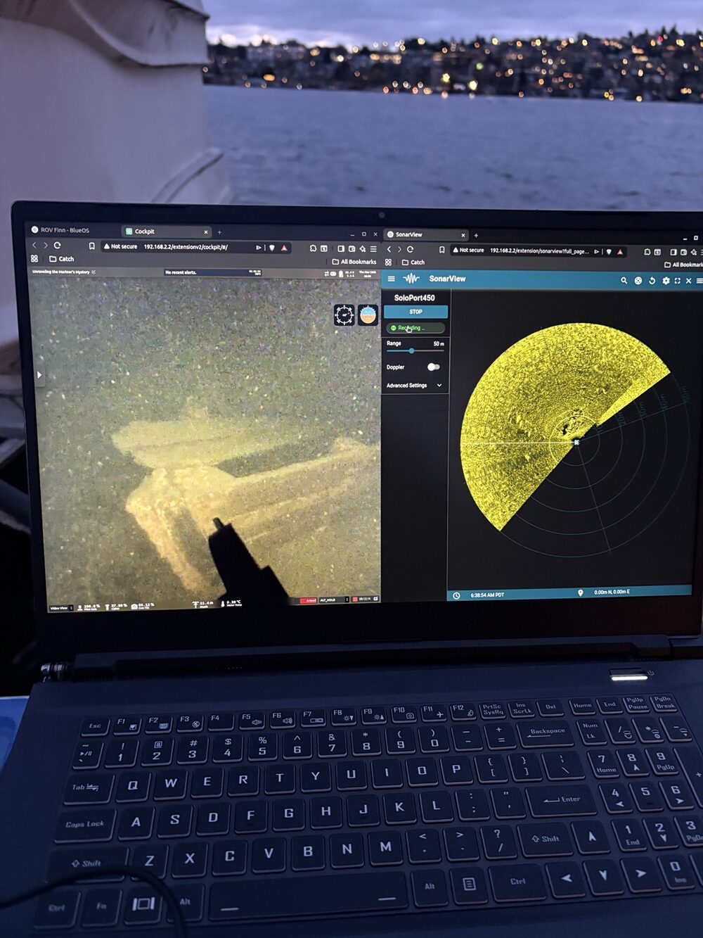 Live ROV video feed and side-scan sonar view running side by side during a dive